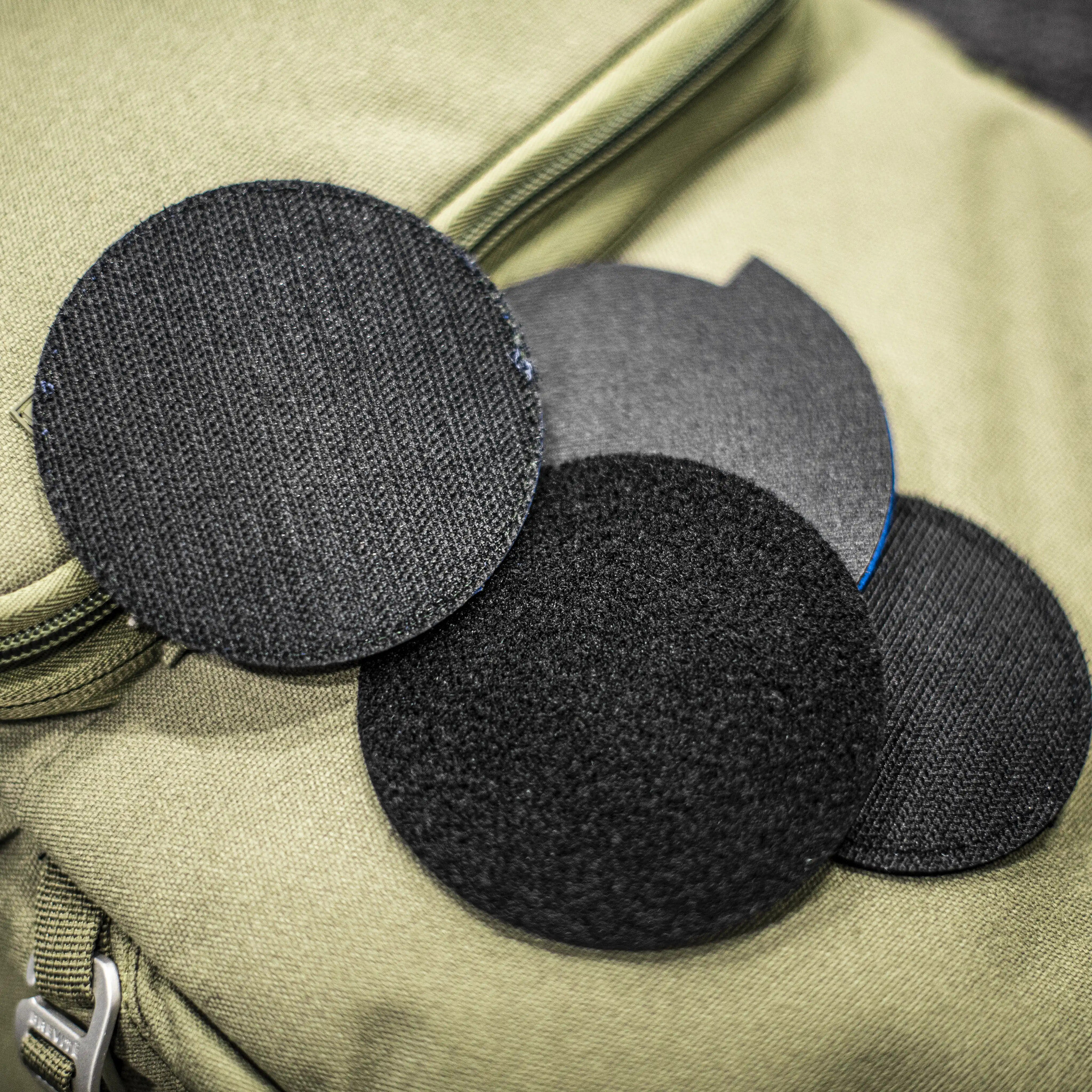 Hook and loop patch backing